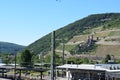 Bingen, Germany 06 14 2021: view across the train station BingenerbrÃÂ¼ck towards ruin Ehrenstein Royalty Free Stock Photo