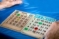 Bingo Cards Close-Up with Hands Royalty Free Stock Photo