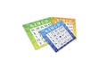 Bingo composition with blue, green and orange tickets on the white background