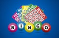 Bingo lottery balls and bingo cards concept Royalty Free Stock Photo