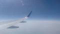 Bings of airplane and blue sky