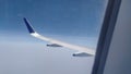 Bings of airplane and blue sky