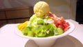 Bingsu Korea Food Fruits such as Mango, Kiwi, Strawberry with Ice Cream on Table