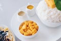 Bingsu mango Korean Desserts Shaved ice desserts with mango, Banana cold crepe Japanese Des Royalty Free Stock Photo