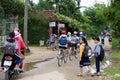 Vietnamese pupil ride bike from school