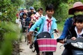 Asian little girl ride cycle from school