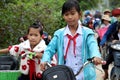 Asian little girl ride cycle from school