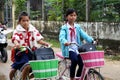 Asian little girl ride cycle from school