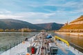 Binnenvaart, Translation Inlandshipping on the river rhein in Germany during sunset hours, Gas tanker vessel rhine river Royalty Free Stock Photo