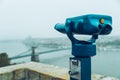 Binocular against observation deck view. Royalty Free Stock Photo