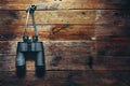 Binocular Hanging On A Wooden Wall, Copy Space With Right. Adventure Travel Scout Journey Concept Royalty Free Stock Photo