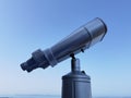 Binocular isolated on the blue sky watching on the sea Royalty Free Stock Photo