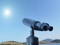 Binocular isolated on the blue sky watching on the sea Royalty Free Stock Photo