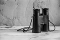 Binoculars allows the viewer to use both eyes (binocular vision) to view distant objects