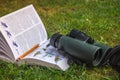 Binoculars and Bird Guide Royalty Free Stock Photo