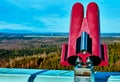 Binoculars with coin slot on the upper platform of the Joseph`s cross for detailed observation and viewing of the landscape with