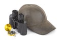Binoculars, compass and cap Royalty Free Stock Photo