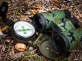 Binoculars and compass close up Royalty Free Stock Photo