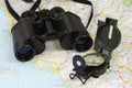 Binoculars, compass and map Royalty Free Stock Photo