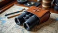 Binoculars in leather case on vintage map with pencils and compass Royalty Free Stock Photo