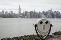 Binoculars and New York City Manhattan skyline Royalty Free Stock Photo