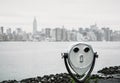 Binoculars and New York City Manhattan skyline Royalty Free Stock Photo