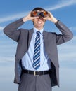 Binoculars, opportunity and search for business man with blue sky, smile and investigation. Executive, job and searching