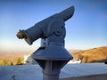 Binoculars in a public Park on the mountains to view the area. without man