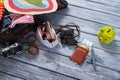 Binoculars and suitcase with clothes. Royalty Free Stock Photo