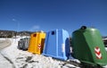 Bins for the collection of waste in winter with snow