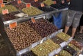 Bins of olives in market