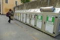 Bins for recycling and garbage collection worker in the city Aosta Italy