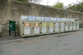 Bins for recycling and garbage collection worker in the city Aosta Italy