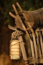 Binto vines, fish catchers and antique looms hang on old carts in rural Thailand. Royalty Free Stock Photo