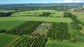 Bio farmer dron aerial field farming vegetable agricultural farm garden plantation fruit tree apple orchard video shot