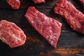 Bio Flank bavette or flap steak beef t steak near tri-tip and top blade oyster cuts close up in front of other cuts in butchery on Royalty Free Stock Photo