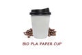 Bio paper cup of coffee to go with coffee beans on white background.