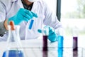 Biochemistry laboratory research, Chemist is analyzing sample in Royalty Free Stock Photo