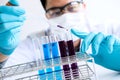 Biochemistry laboratory research, Chemist is analyzing sample in Royalty Free Stock Photo