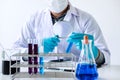 Biochemistry laboratory research, Chemist is analyzing sample in Royalty Free Stock Photo