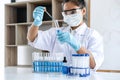 Biochemistry laboratory research, Chemist is analyzing sample in laboratory with equipment and science experiments glassware Royalty Free Stock Photo