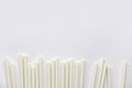Biodegradable eco friendly white paper drinking straw isolated on white background with copy space Royalty Free Stock Photo