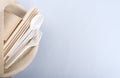 Biodegradable plate, fork, spoon, knife, cup and straws with copy space Royalty Free Stock Photo