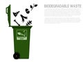Biodegradable waste icon is falling in to the bin