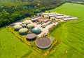 Biogas plant and farm. Royalty Free Stock Photo