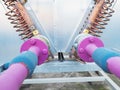 Biogas powerplant cooler.  Pink and blue pipes, flangess Royalty Free Stock Photo