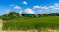 biogas production, biogas plant, bio power.with field Royalty Free Stock Photo