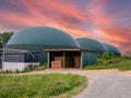 biogas production, biogas plant, bio power with sunset Royalty Free Stock Photo