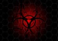 Biohazard dark red symbol behind mesh metal Royalty Free Stock Photo