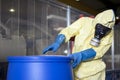 Biohazard expert disposing infested material